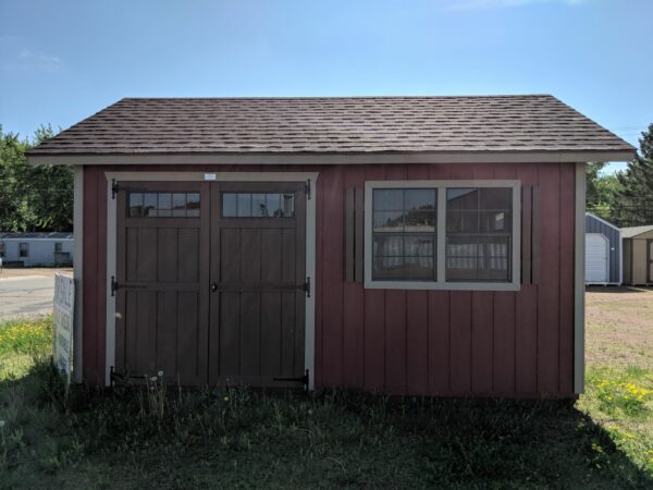 12x16 Utility shed for sale with overhangs and transom window doors